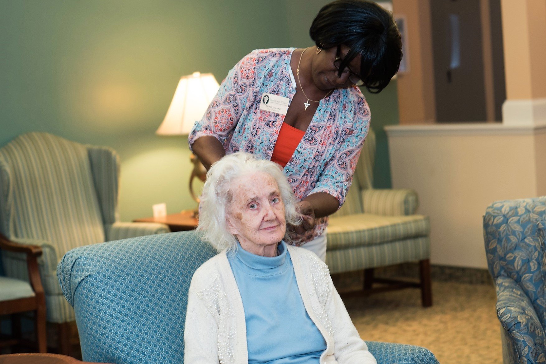 alzheimer's care facility resident being cared for