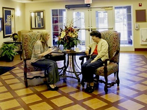 resident sitting with visitor 