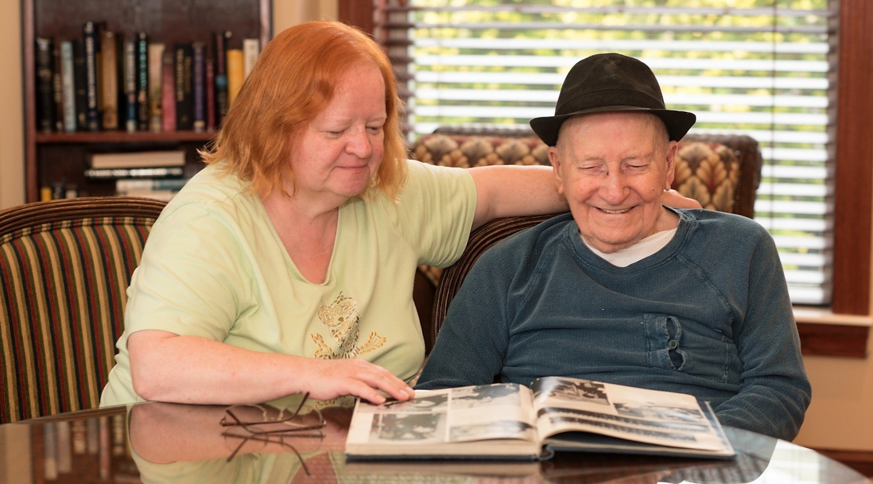 Elderly Residents reading in Tennyson Court Library