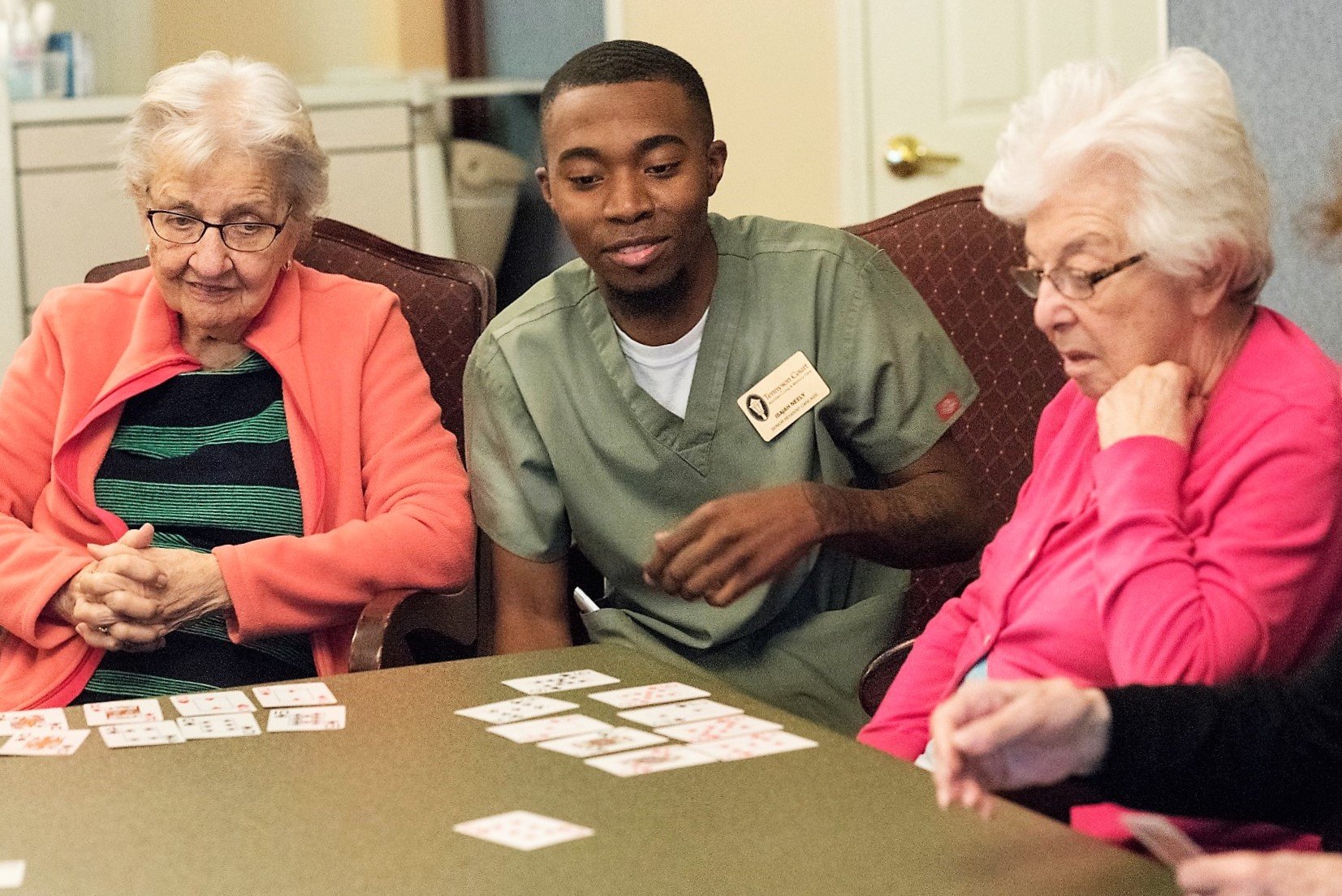 team playing a game with memory care patients